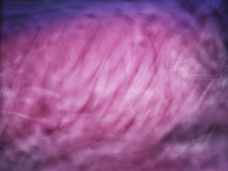 Blurred swirled shapes of pinks, and purples abstract background artwork for creative graphic design or wall artの写真素材