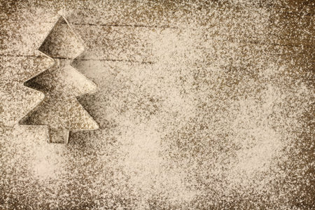 Cookie cutter on the background of woodの写真素材