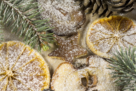 Dried Christmas fruit on the background of woodの写真素材