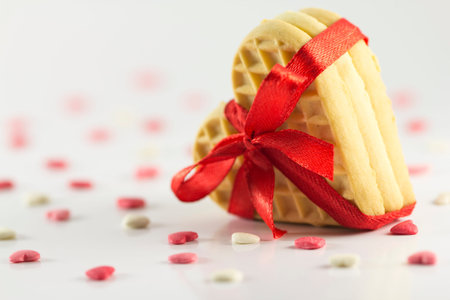 Valentine's Day - cookies in the form of hearts on a white backgroundの写真素材