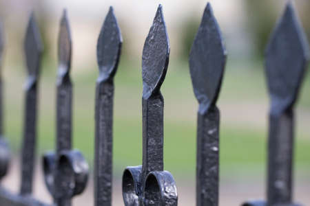 View individual wrought-iron fence elementsの写真素材