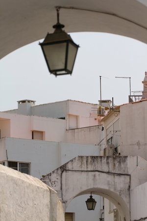 A view of the arch in the old town of Albufeira, Portugalの写真素材