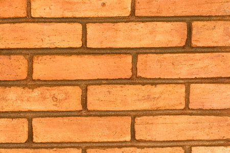 Stone wall of the rectangular bricks - close up