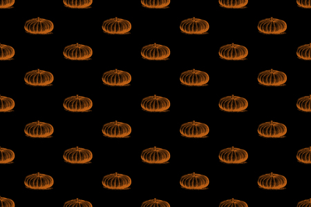 Pumpkin pattern on an black background. Pumpkin patch. Wrapping paper design.の写真素材