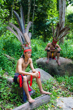 Malaysian aborigines in national costumes, Borneo island, Malaysia.のeditorial素材