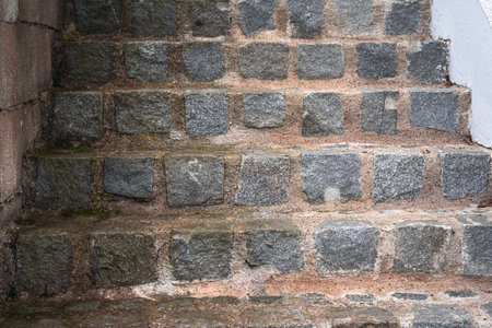 Old stone staircase closeup. crumble with age. construction, repair. concept of destruction, decline. High quality photoの写真素材