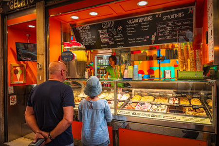 Unidentified people at a fast food kiosk in Venice Italyの写真素材