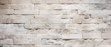 White brick wall texture background. Modern style design decorative uneven cracked real stone surface.の素材