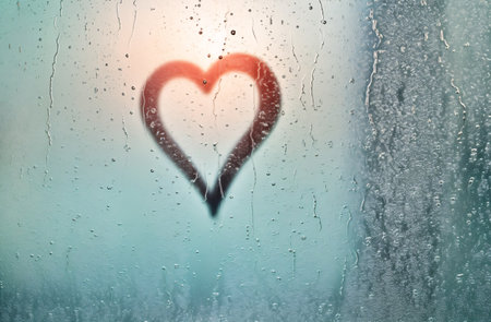 Heart on the misted glass, Valentine's Day background.の素材