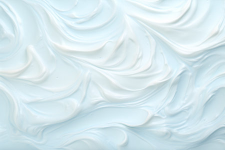 close up of a white whipped cream texture on a white backgroundの素材