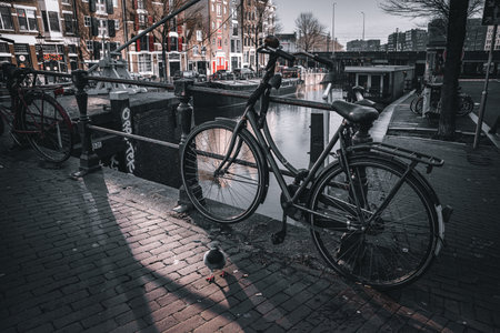 Bicycles on the canal in Amsterdamの写真素材