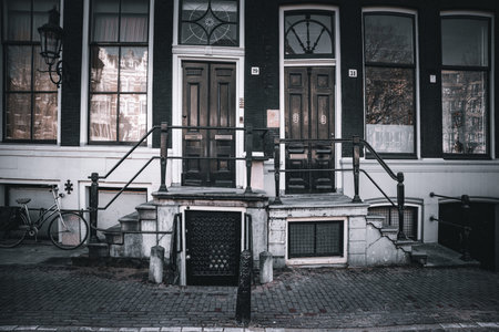 Traditional houses in Amsterdam, Netherlands. Black and white toned image.