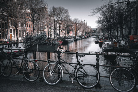 Bicycles parked along the canals of Amsterdam.の写真素材