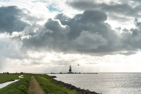 Seascape with a lighthouse on the Baltic Sea in Gdansk, Poland.の写真素材