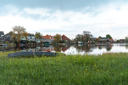Typical houses along the canal in the center of Marken, Netherlandsの写真素材