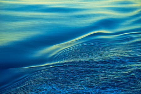 The sea level moves smoothly to create layers of ripples. Nature is peaceful and serene, the deep...