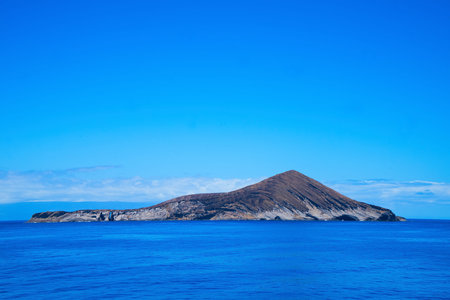 One of the small islands in the Hawaiian Islands. The view from the cruise ship. June 2019.の写真素材