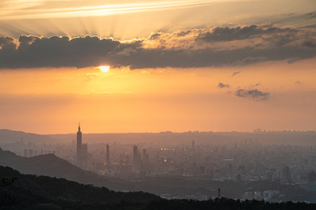 Emotional Taipei Sunset: Awe-Inspiring Skies and Cityscape in Motion Spectacular Evening Views of Taipei: Dynamic Clouds and Cityscapeの写真素材
