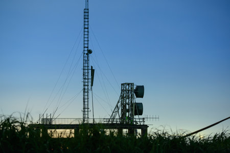 Abandoned antenna equipment at a radar station. Long exposure shot at night. Viewing platform of...
