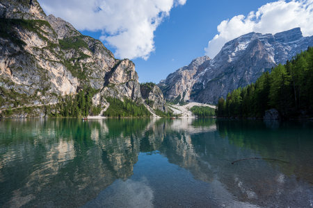 The lake is clear, sometimes green, sometimes blue, and surrounded by mountains. Nature's...