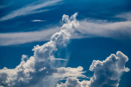 Blue sky and unpredictable white clouds. Amazing nature. Guishan Island(Turtle Island) is a volcanic...
