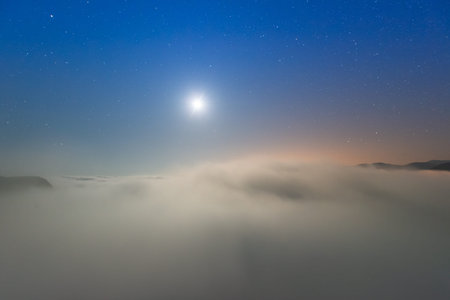 The sea of clouds on a quiet moonlit night makes you feel unpredictable. Peaks surrounding Emerald...
