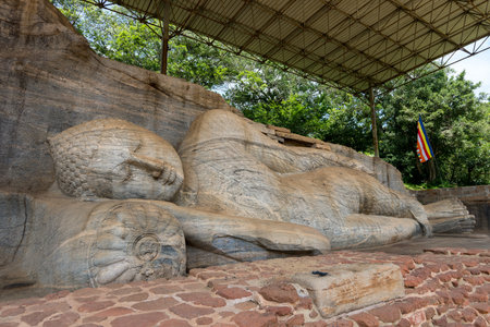 A captivating view of the Gal Vihara (Viharaya) or Rock Temple, a significant archaeological site in the Ancient City of Polonnaruwa, Sri Lanka.の写真素材