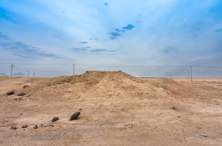 A conspicuous ventilation shaft of a Qanat in Isfahan. The kanat not only provides essential drinking water, but also helps to lower the indoor temperature. Isfahan, Iran.の写真素材