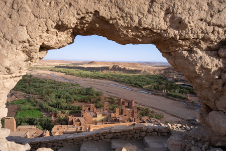 View of Ouarzazate from the Kasbah of Ait Ben Haddou. River dry season.The Berbers built many...