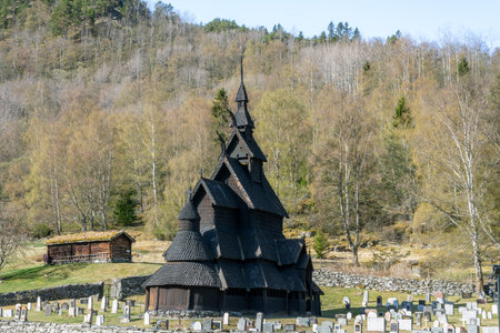 The iconic Borgund Stave Church, a well-preserved wooden church built around 1180. Its intricate carvings and unique architecture make it a popular tourist destination. Borgund, Norway.の写真素材