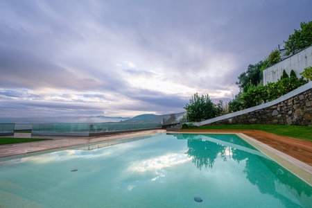 Lamego, Portugal - November 14, 2024: Outdoor pool at a hilltop hotel overlooks Douro Valley...