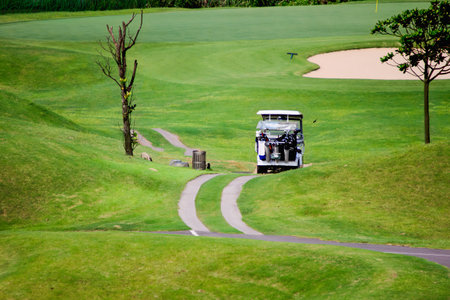 A close up view of the vibrant green fairways and undulating terrain at Golf Course in Luzhu Taoyuan Taiwan, showcasing pristine natural beauty.の写真素材