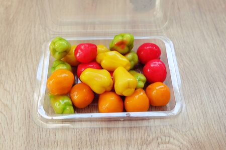 Thai dessert green bean Look choop fruit in plastic box.の写真素材