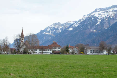 Interlaken in canton of Bern,  region of Swiss Alps. Interlaken is a very popular tourist  Swiss town destination in Europe.の写真素材