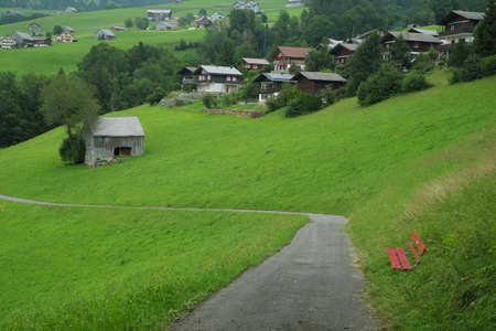 Beautiful alpine pasture villages - Amden in the canton of St. Gallen in Switzerland. Swiss alps landscape view.の写真素材