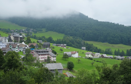 Beautiful alpine pasture villages - Amden in the canton of St. Gallen in Switzerland. Swiss alps landscape view.の写真素材
