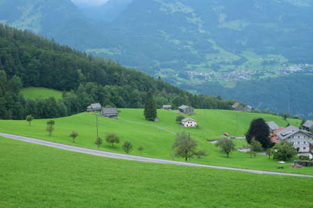 Beautiful alpine pasture villages - Amden in the canton of St. Gallen in Switzerland. Swiss alps landscape view.の写真素材
