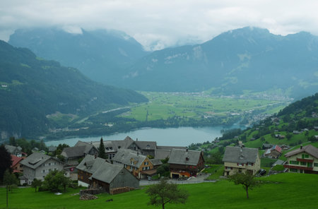 Beautiful alpine pasture villages - Amden in the canton of St. Gallen in Switzerland. Swiss alps landscape view.の写真素材