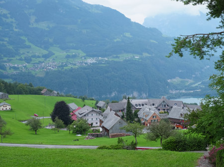 Beautiful alpine pasture villages - Amden in the canton of St. Gallen in Switzerland. Swiss alps landscape view.の写真素材