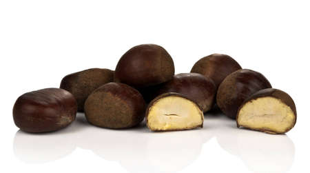 Chestnuts isolated on whiteの写真素材