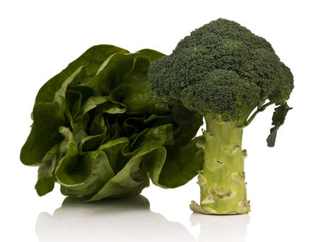 Broccoli and lettuce isolated on whiteの写真素材