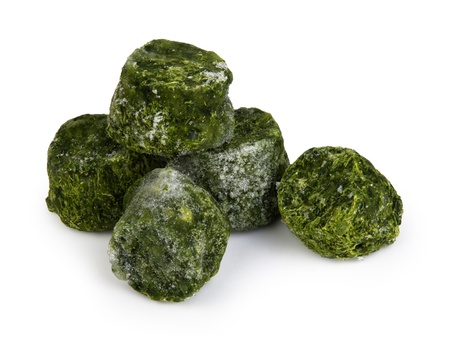 Frozen spinach isolated on whiteの写真素材