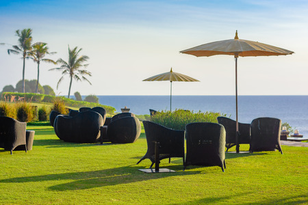 A beautiful outdoor setting on the grass overlooking the seaの写真素材