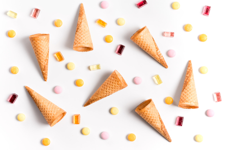 Ice crean cones and candy lay flat image wallpaperの写真素材