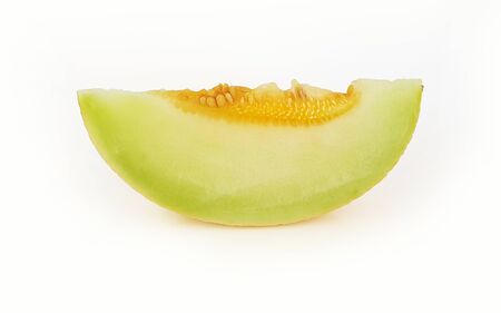 melon yellow cut on the write backgroundの写真素材