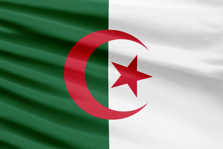 Algeria flag is depicted on a sport stitch cloth fabric with folds.の写真素材
