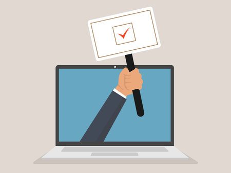 hand holding vote banner on laptop, President election government and campaign
