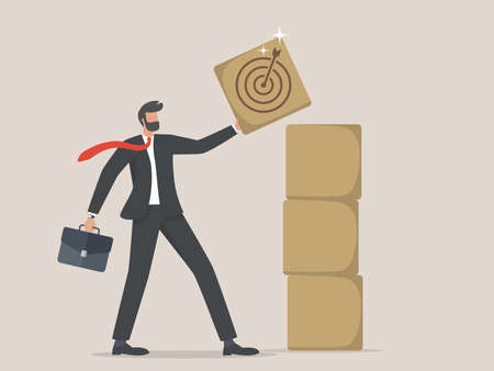 Businessman holding wooden cube with targetのイラスト素材
