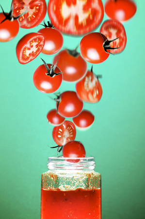 tomato jam on green backgroundの写真素材