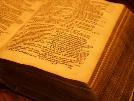 Old bible in candlelight
